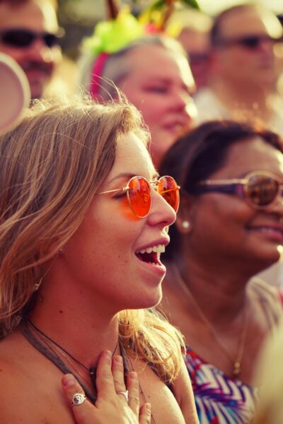 woman wearing red sunglasses